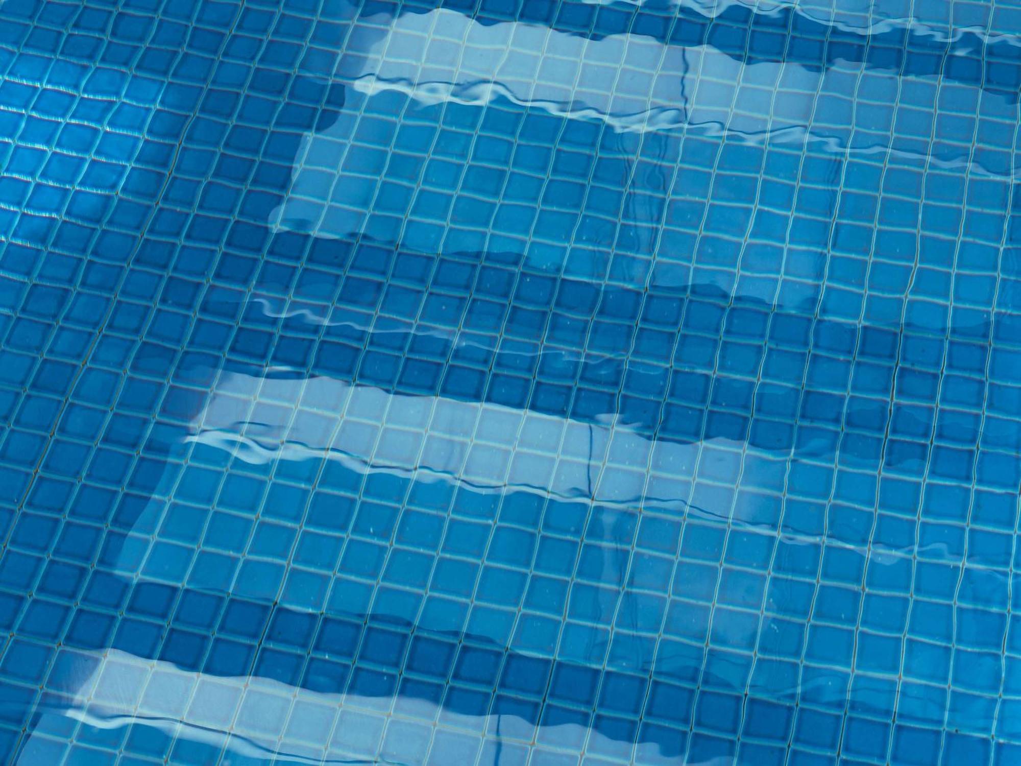 The Olsen Melbourne Art Series Exterior photo A swimming pool with a damaged liner